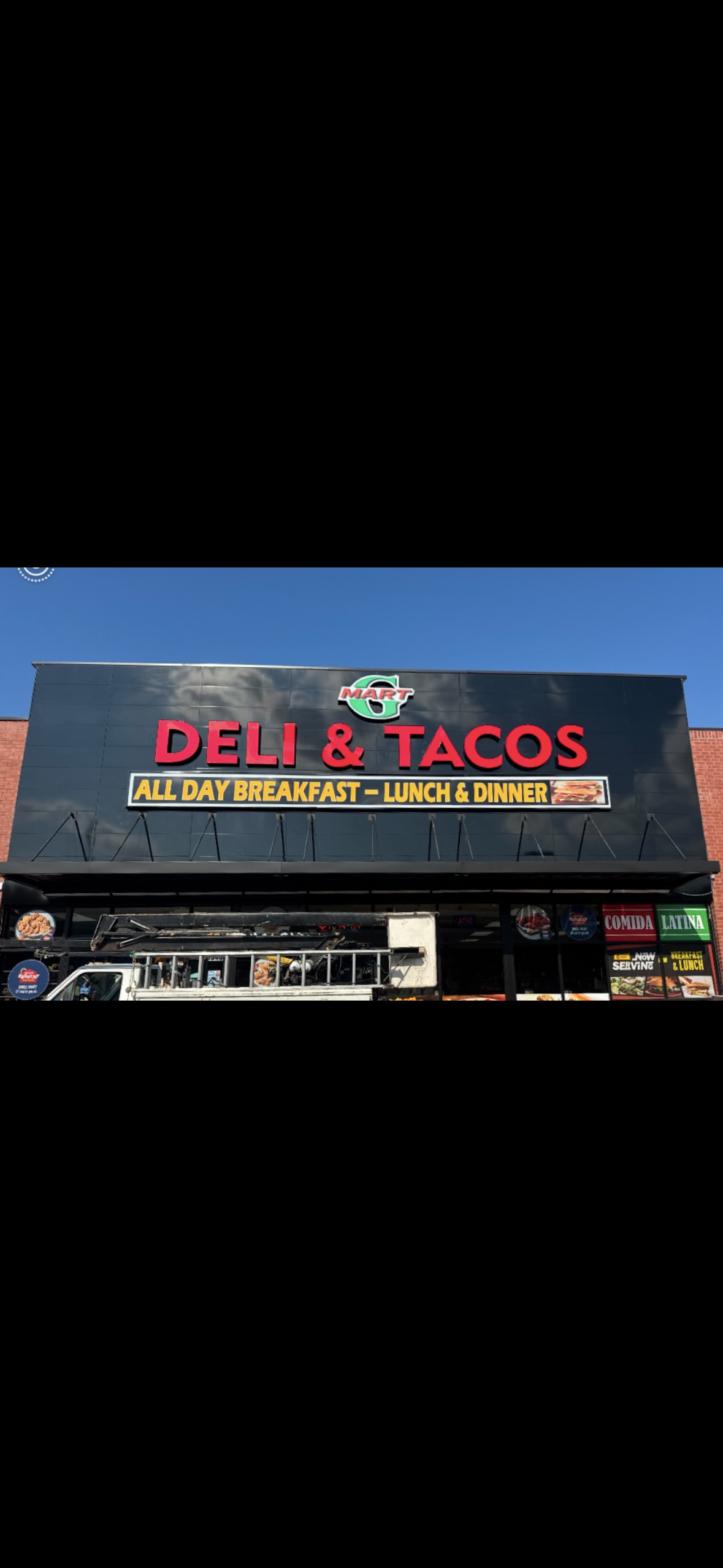 Mart Deli & Tacos storefront sign